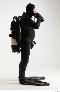 Jake Perry Diver with Scuba fitting mask standing whole body…